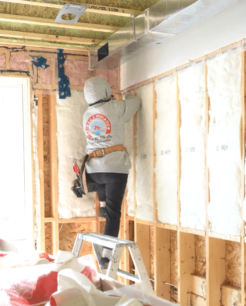 Batt insulation installed inside wall framing in Toronto